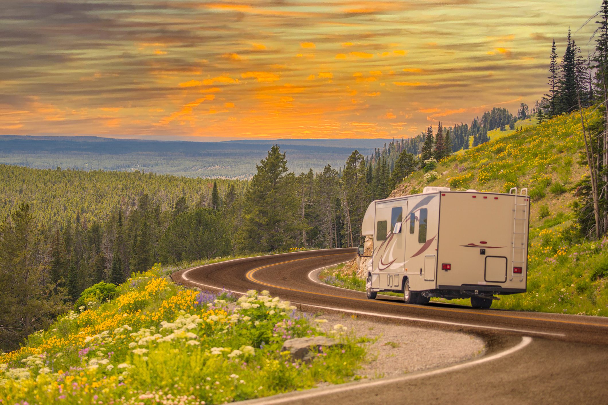 Camper Driving Down Road
